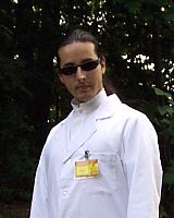 Another picture of me in my "mad scientist" garb. The badge I'm wearing reads "The bearer of thispermit is licensed to carry or conceal non-strategic nuclear weapons for personal defense" :)