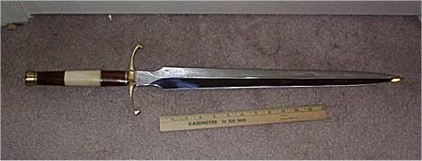 My short-sword from Dagger Dan Heineche at MD RenFest. It's one ofthe most beautiful and most finely crafted pieces I've seen. Itranks among the best in my collection.