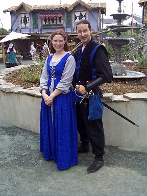 This was on my 4th and final excursion to the VA RenFest this year.. Only a smallgroup went this time, so I don't have a group shot of us. Here we see Wolvendove (Amanda),and Bones (me). She thought this wasn't a very good picture of her. Actually, I don'tthink it's that great of a picture of me either (which means it's probably one of the moreaccurate, but considering that I seem to look different in each picture, one can neverbe too sure). Oh well. At least the color was picked up by the camera very well. (No, we're not a couple, just half of the group that went that weekend)