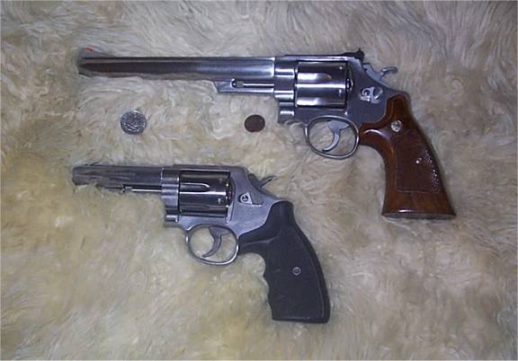 The new .44 Magnum (S&W 629, above) in comparison with my old.357 Magnum (S&W Model 65, below). Now that's</I> a gun. (Interesting note- The S&W 629 is the model used in <A href="http://www.sledgehammeronline.com/">the Sledge Hammer series</A>. However, they used a 6" barrel version. Mine is 8")