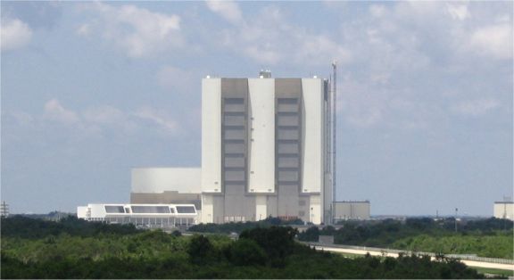 On our fourth day, we started out at Kennedy Space Center. We started with the bus tour.This view shows the VAB (Vehicular Assembly Building), and to the lower left of it is themain mission-control center.