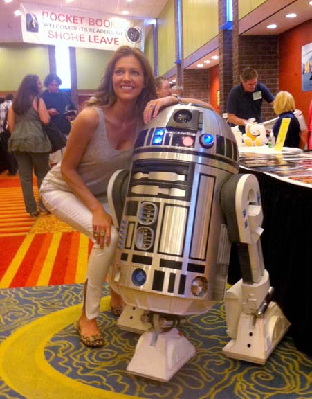 Tricia Helfer (Six from Battlestar Galactica) with R2. Apparently the photo went somewhat viral, in small circles. Usually taggedas R2D2 rather than R2-T0, of course, but I suspect Tricia Helfer just enjoyed spending time with a fellow robot in any case. :)