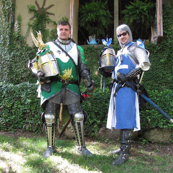Sir Brian and myself, looking heroic in our knightly armor. The ailettes, colorful surcoats, and great helms complete with mantle, torse, and crestreally complete the look.