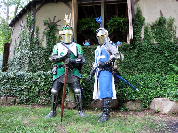 Sir Brian and myself, looking heroic in our knightly armor. The ailettes, colorful surcoats, and great helms complete with mantle, torse, and crestreally complete the look.