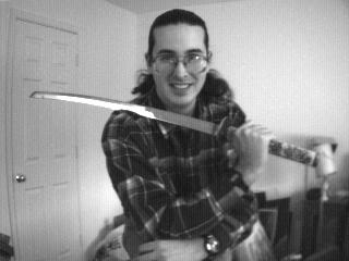 Another portrait of me, bearing a japanese style sword.