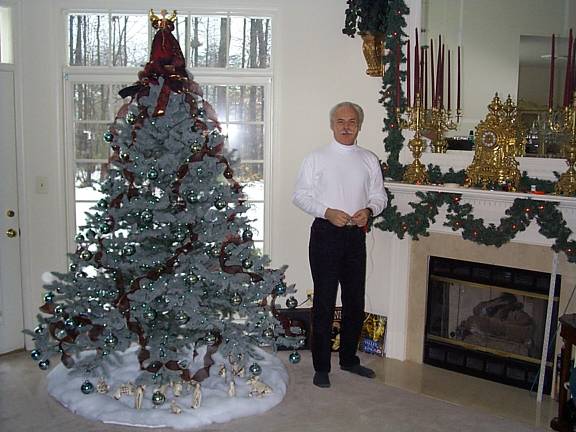 My dad and his Christmas tree.