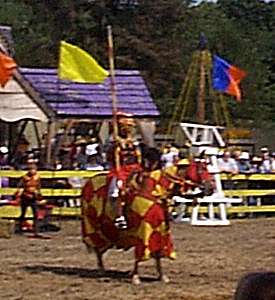 We finally made it out to the Pittsburgh RenFest this year. Itwas our first visit to this pleasant little faire. Here is ashot I took during the joust, though I was a bit far away so please forgive the fuzzy image (and yes, I already did someimage enhancements on it).