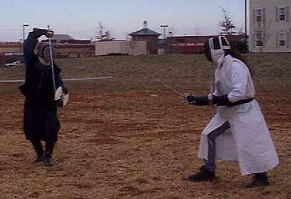 Fighter Practice in the <A href="/stonekeep/">Barony of Stonekeep</A>.I'm the one in white.