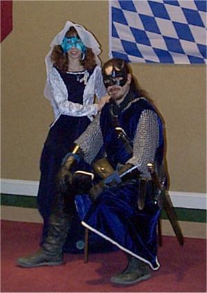 The 12th Night Masked Ball for the Kingdom of Gryphon's Chase...Lady Ketsia and myself. Aren't we quite the pair? We were inmatching dark blue velvet. :)