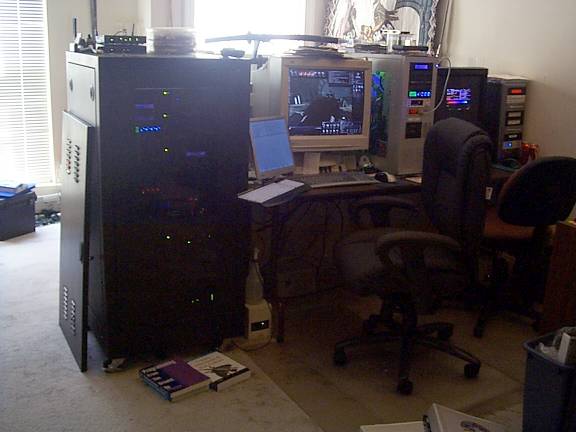 Some new updated pictures, including the tiny LCD for the rack's KVM. These new pictures are of course newer than what I posted on <A href="http://gallery.pimprig.com/showphoto.php?photo=2142&sort=1&cat=504&page=4">PimpRig.com</A>.