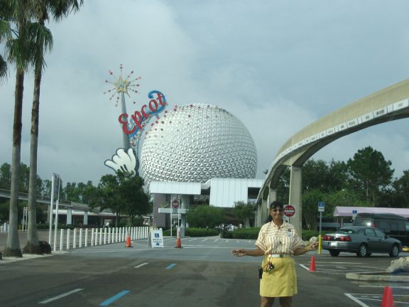 After spending the first day of our vacation just getting there, and getting settled intothe hotel, our second day was actually our first day to hit the amusement parks. Westarted with Epcot, and this was the view from the car as we pulled into the parkinglot. The smirk on this lady's face was because I was taking the picture while driving. :)