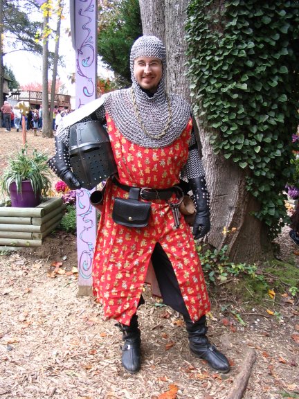 The teddy-bear surcoat lives again! Yes, my first time in many years toparticipate in "The Day of Wrong" This one doesn't wear as well, and of course, well, chainmail tendsto bunch up in certain areas and amplify your gut a bit. The amusing thing is that many people would ask for my picture, and compliment me on the armor, and THEN realize I was wearing teddy-bearflannel. Ah yes, the joys of being Sir Ted de Bear, Knight of the Order of Saint Theodore. lol!
