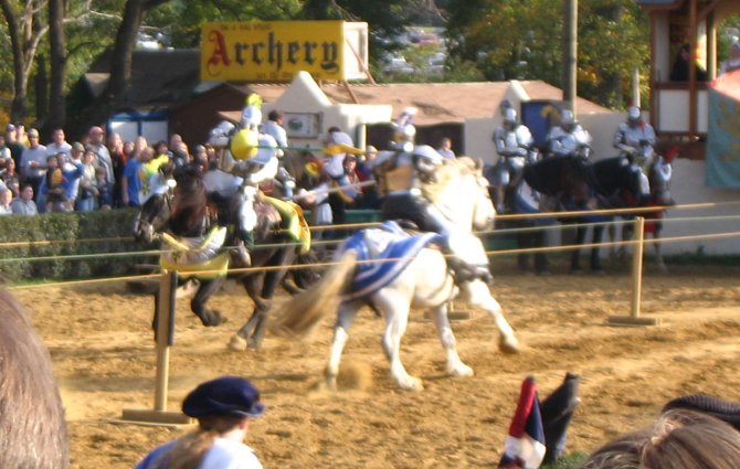 MDRF closing weekend: Jousting Tournament. A pass in the jousting tournament. Sir Trystan of Anglesey on the left, andthe lady knight whose name I can't remember on the right.