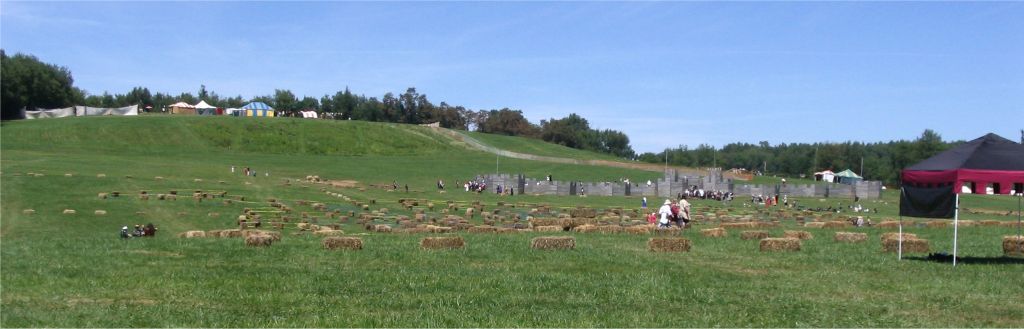 The battlefield. Atop the hill is the archery range, and on the hillside isthe roman numeral "XXXV" since this is Pennsic 35.