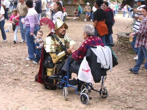 This was such a great scene. The knight you see here wassinging to the elderly woman. He got down on one knee, presented her a flower, and sang songs (in Spanish I think). I couldn't quite tell, but she might have had Alzheimer's orsomething similar. She seemed deeply touched