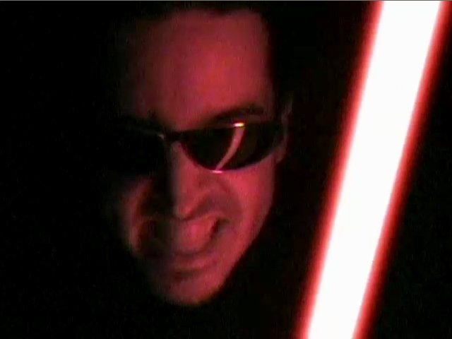 A frame from one of my comedy <A href="//lightsabers.necrobones.com/">lightsaber videos</A>.