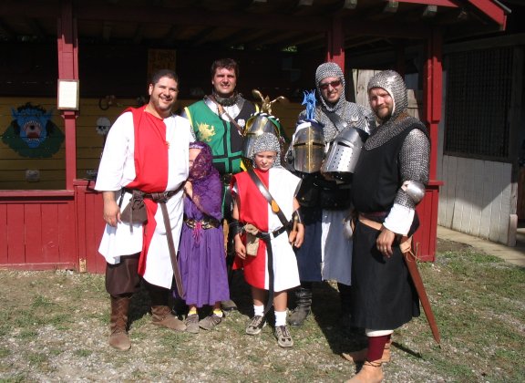 The three knights, and a family in matching garb.