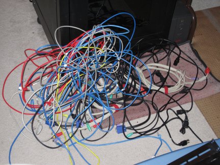 Upon recabling the rack, I was able to pull out old cable by thefist-full. This will all get neatly coiled up and put away.