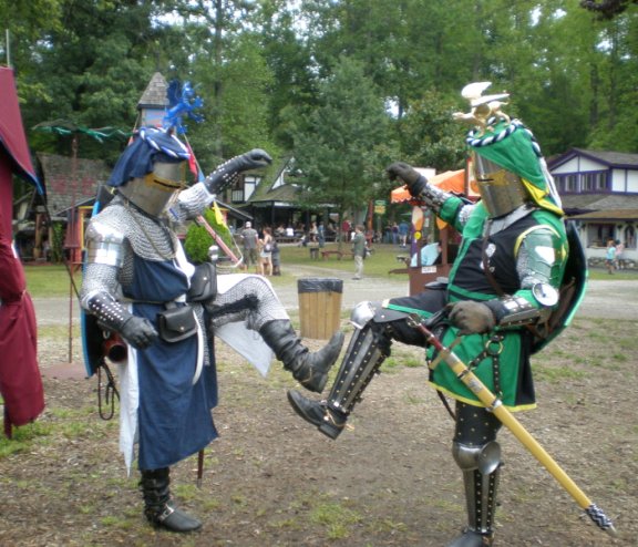Myself (left) and Sir Brian (right), fighting a duel with the deadly spurs!